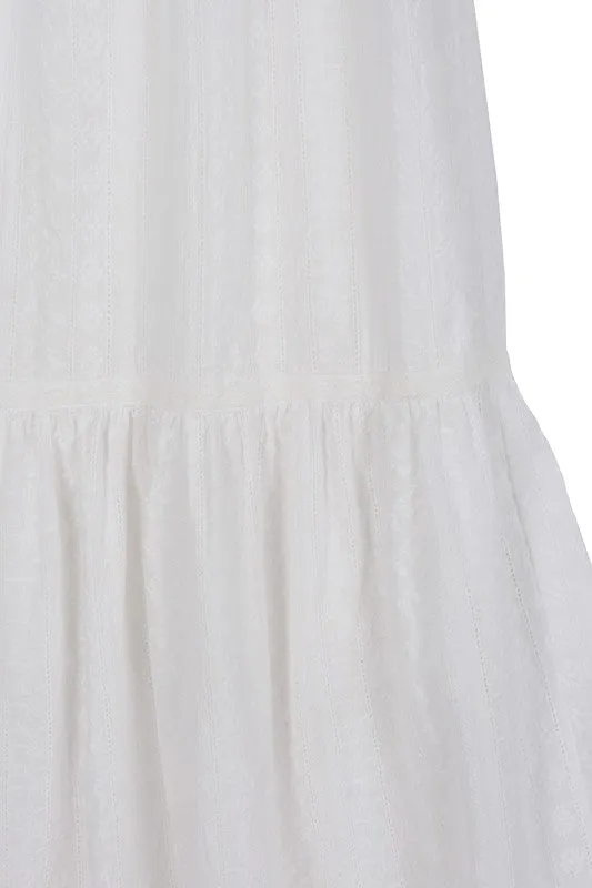 Emilie Embroidered white V neckline tiered dress