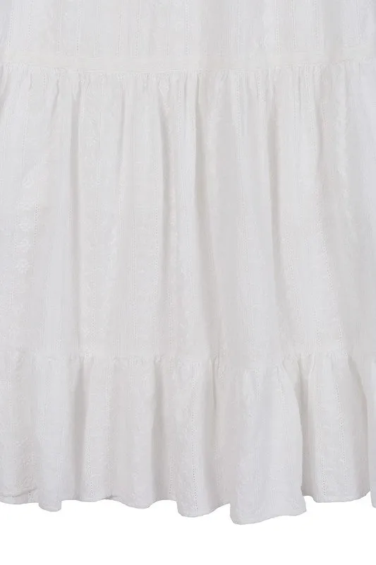Emilie Embroidered white V neckline tiered dress