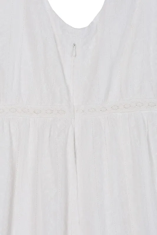 Emilie Embroidered white V neckline tiered dress