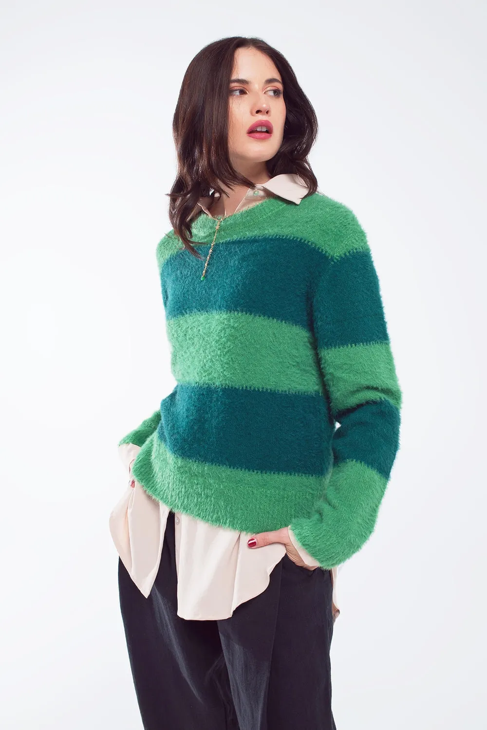 Green sweater with stripes and a crew neck