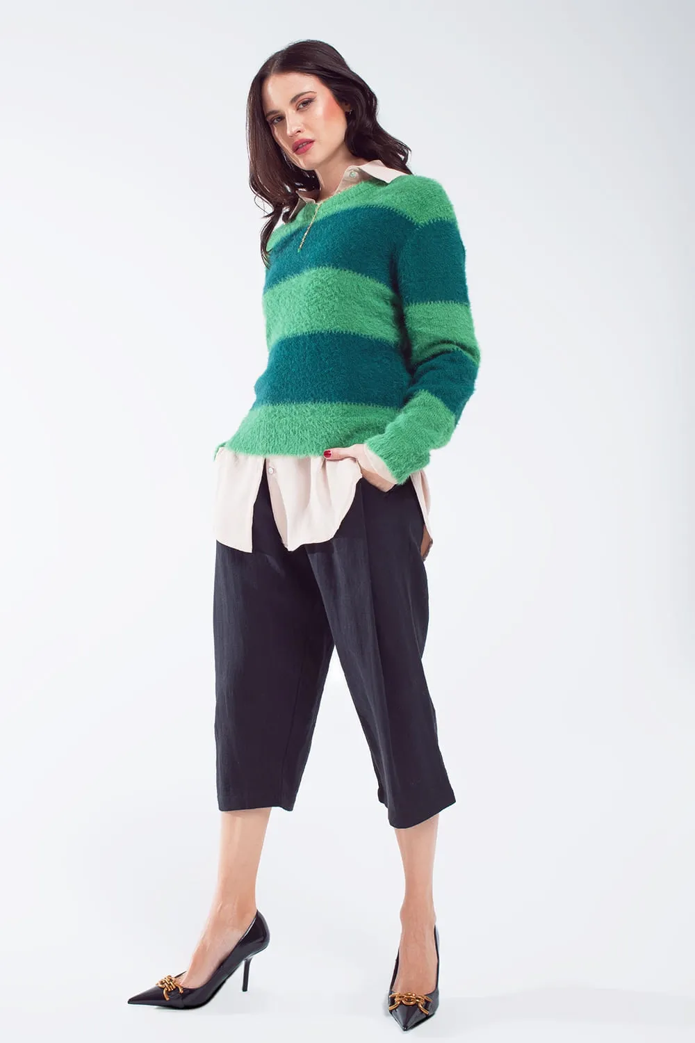 Green sweater with stripes and a crew neck